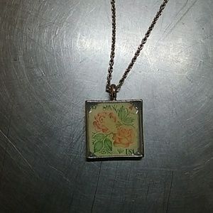 Postage stamp necklace